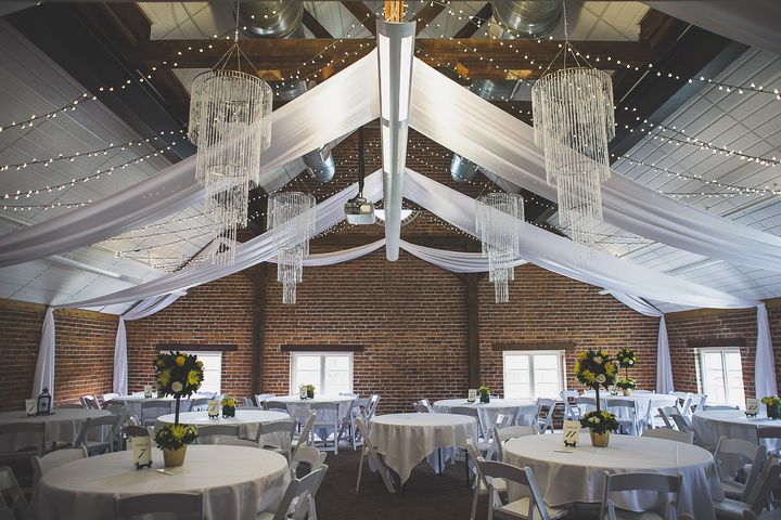 Interior of Centennial Barn, showing decorations and exposed brick